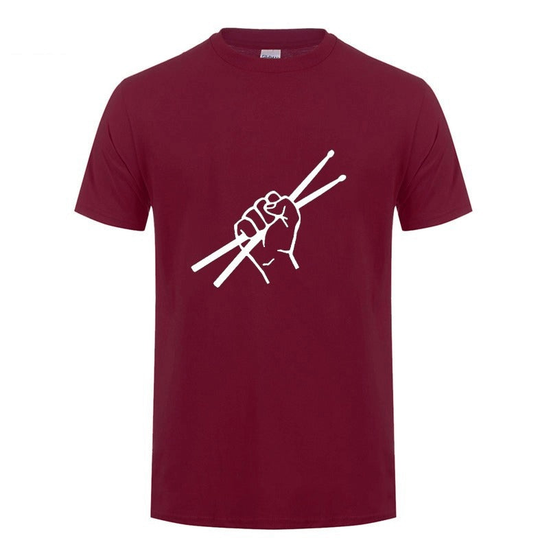Men's maroon drum t-shirt with a white fist holding drumsticks, perfect for drummers and music lovers.