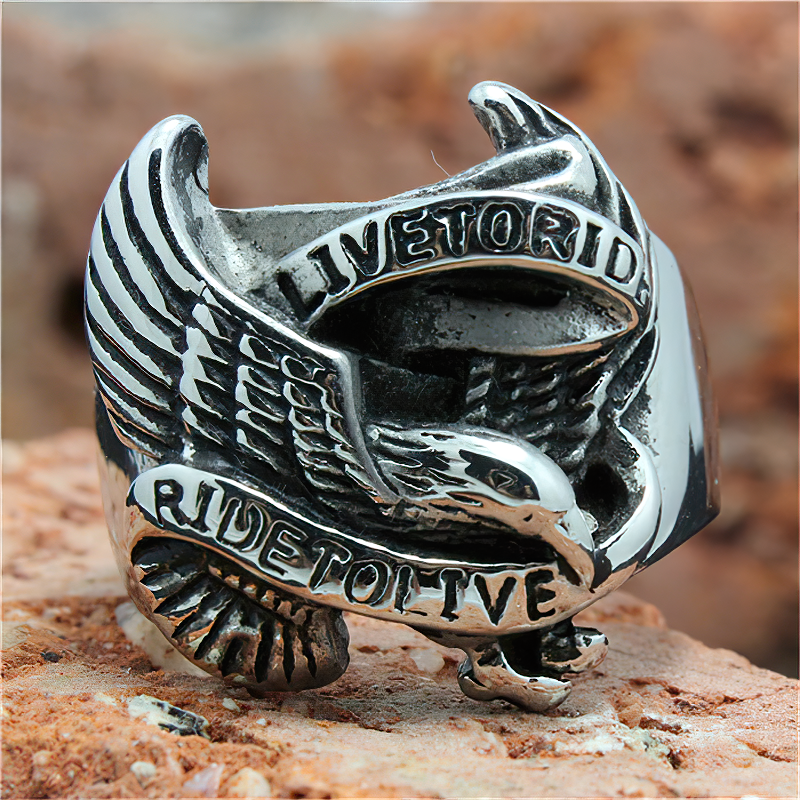 Eagle unisex stainless steel biker ring featuring a detailed eagle design and motivational text, perfect for every style.