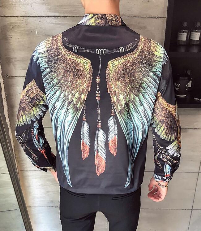 Back view of a men's cotton shirt featuring colorful eagle wings and dreamcatcher elements on a black background.