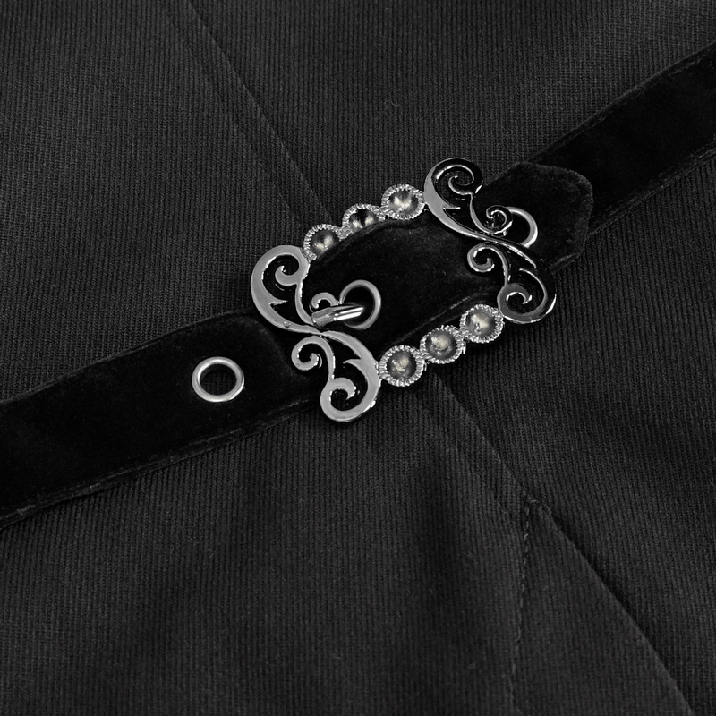 Close-up of the stylish buckle on a vintage black double-breasted tail coat in gothic style.
