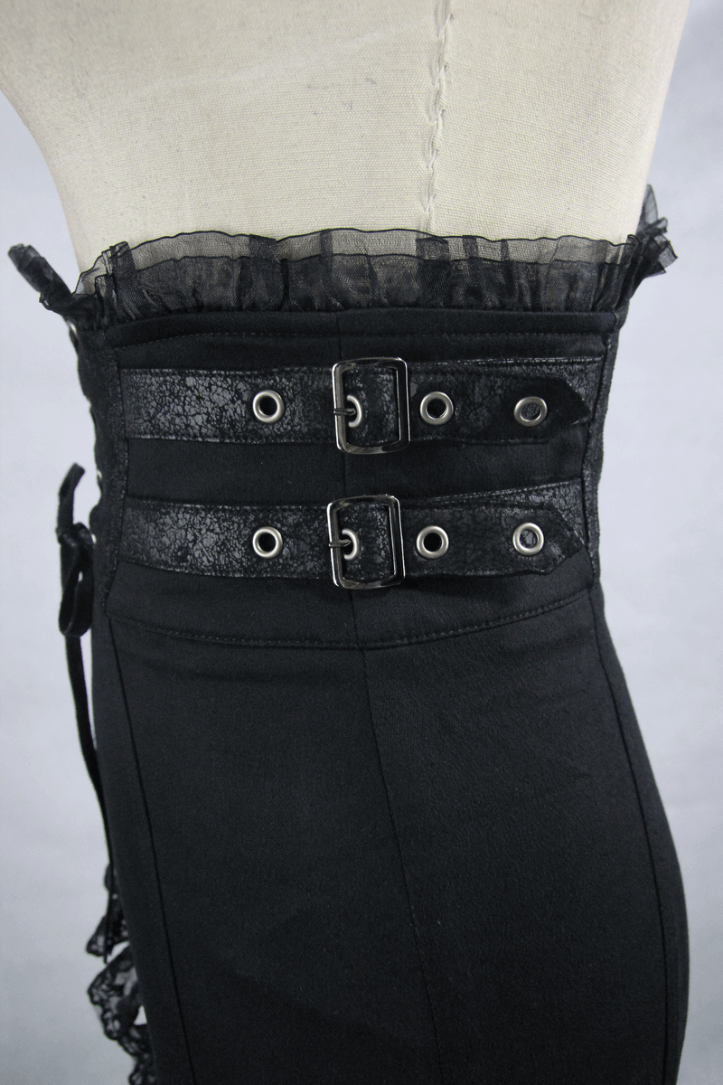 Close-up of elegant black fishtail skirt showing lace and strap details, perfect for gothic fashion.