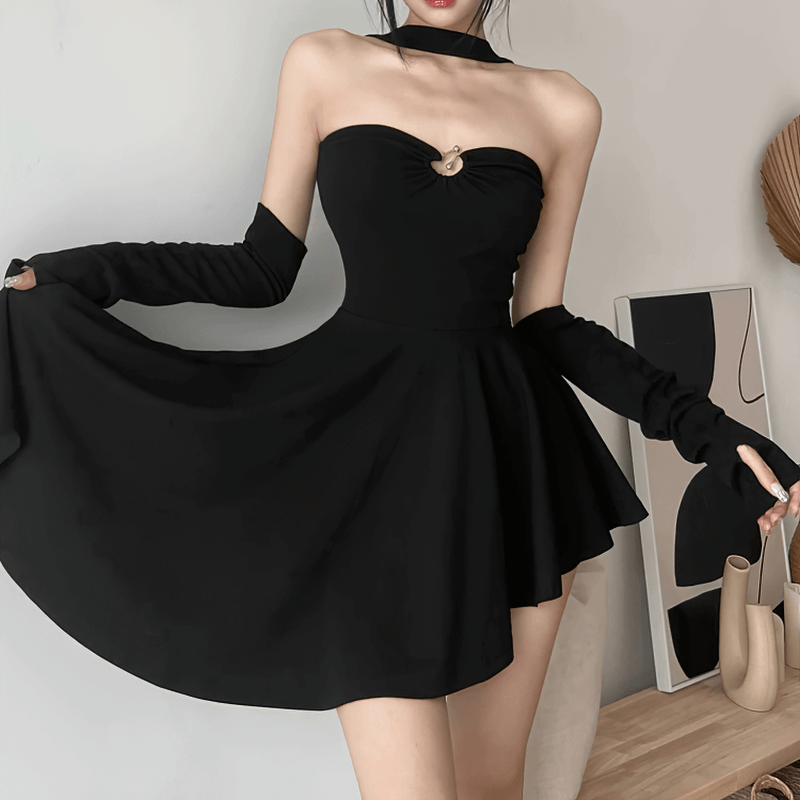 Elegant black halter dress with long sleeves and a playful skirt, showcasing a chic punk style perfect for any occasion.