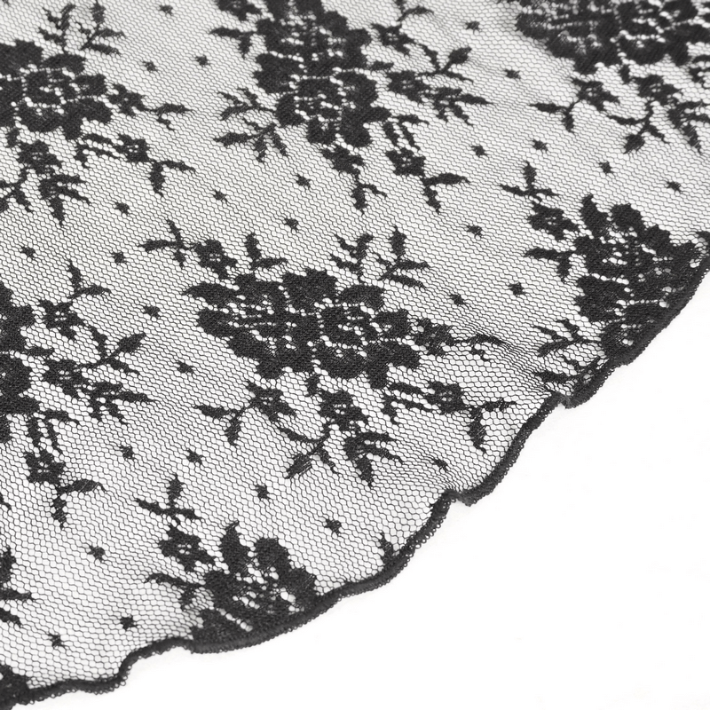 Close-up of elegant black lace fabric featuring floral patterns, perfect for gothic or vintage style clothing.