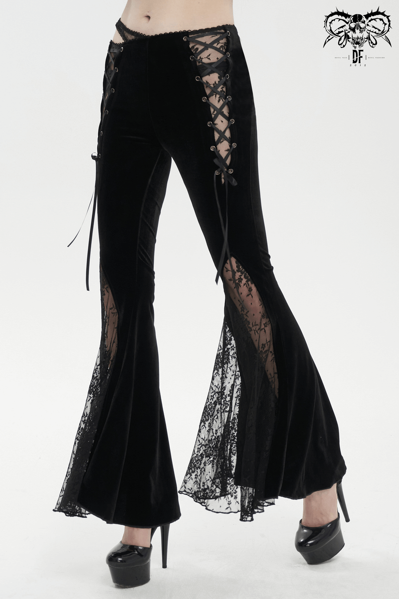 Elegant black flared velvet pants with lace-up details, perfect for a gothic style wardrobe.