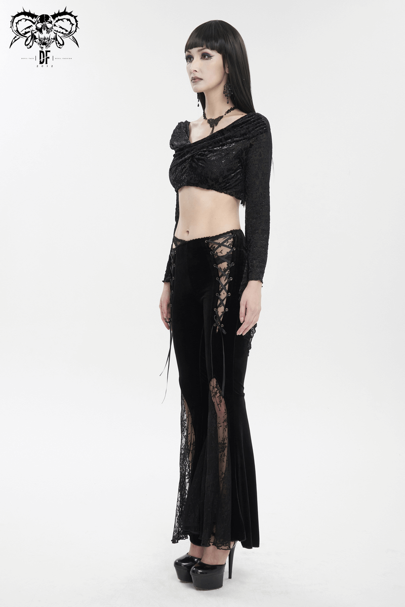 Model showcasing elegant black velvet flared pants with lace details and a gothic crop top.