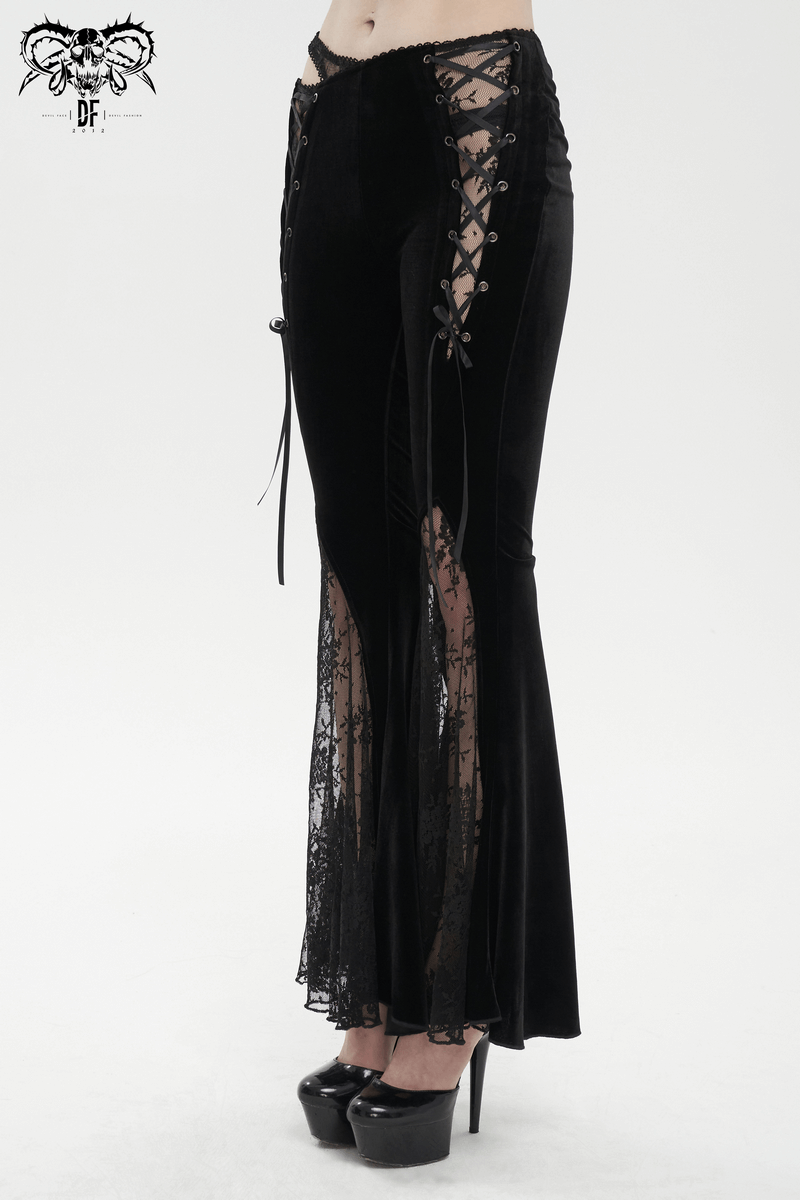 Elegant black velvet flared pants with gothic lace-up detail for women, stylish and luxurious for a chic wardrobe.