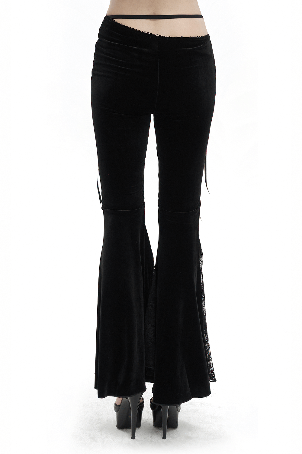 Back view of women's elegant black velvet flared pants with lace detail for a gothic stylish look.