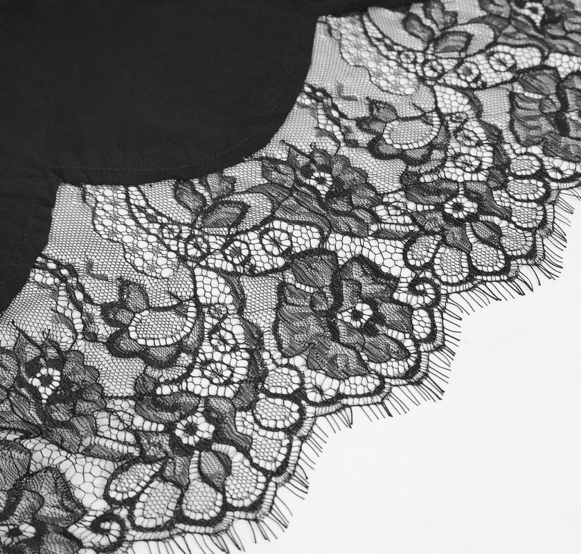 Close-up of elegant black lace trim with floral patterns, perfect for adding luxury to gothic fashion pieces.