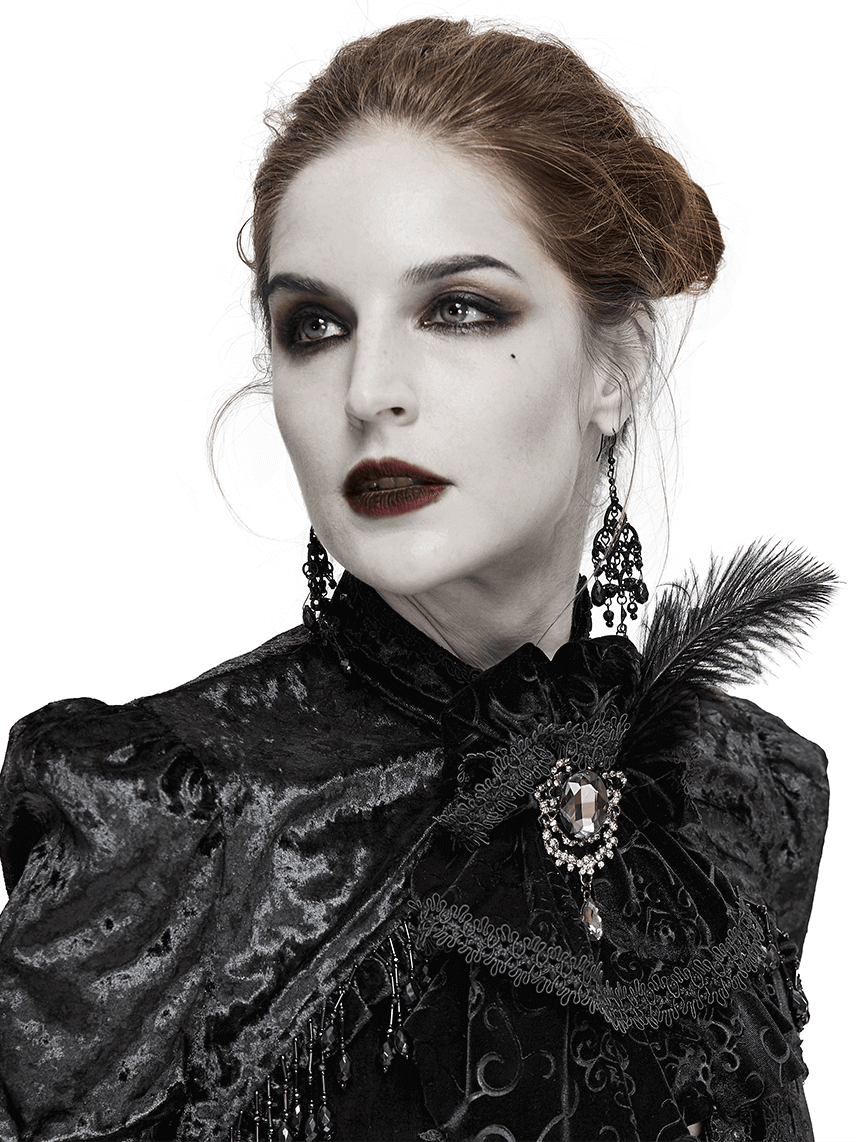 Elegant Gothic woman wearing black lace necktie and feather earring with dramatic makeup.