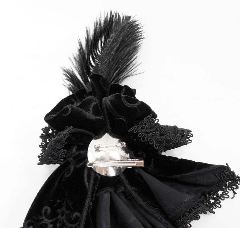 Elegant gothic lace necktie featuring a feather and silver brooch, perfect for alternative fashion styles.