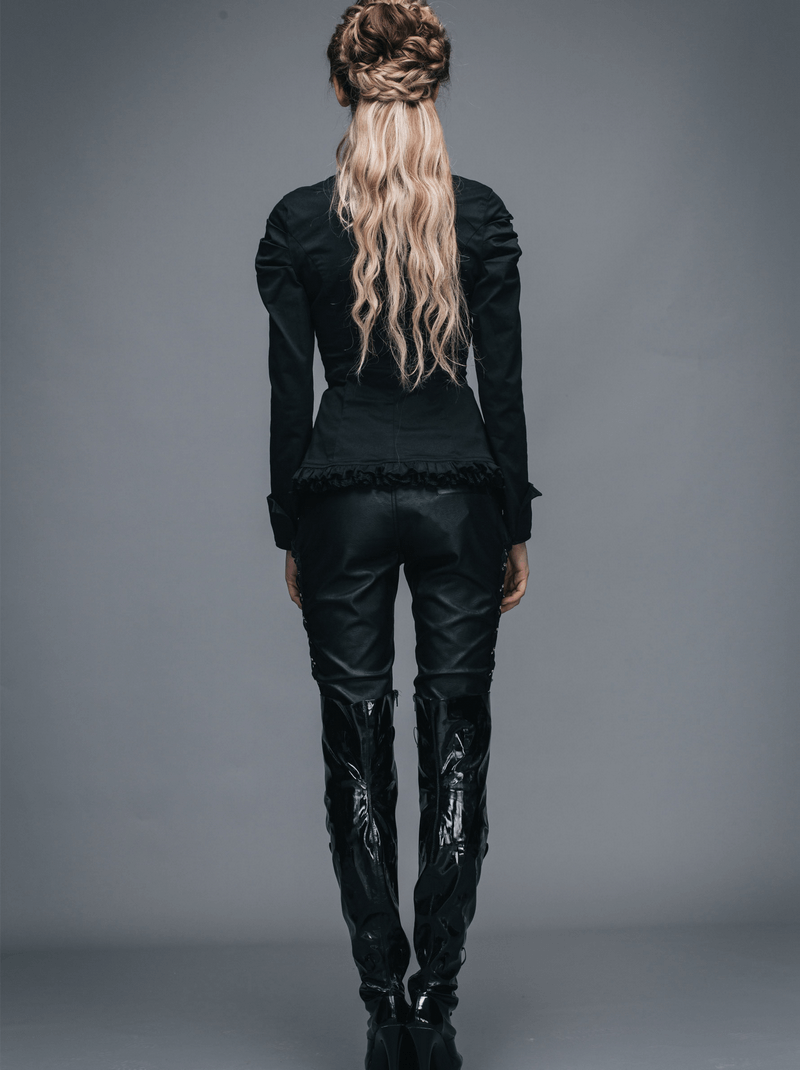 Back view of a woman in an elegant black gothic shirt with stylish leather pants and striking long hair.