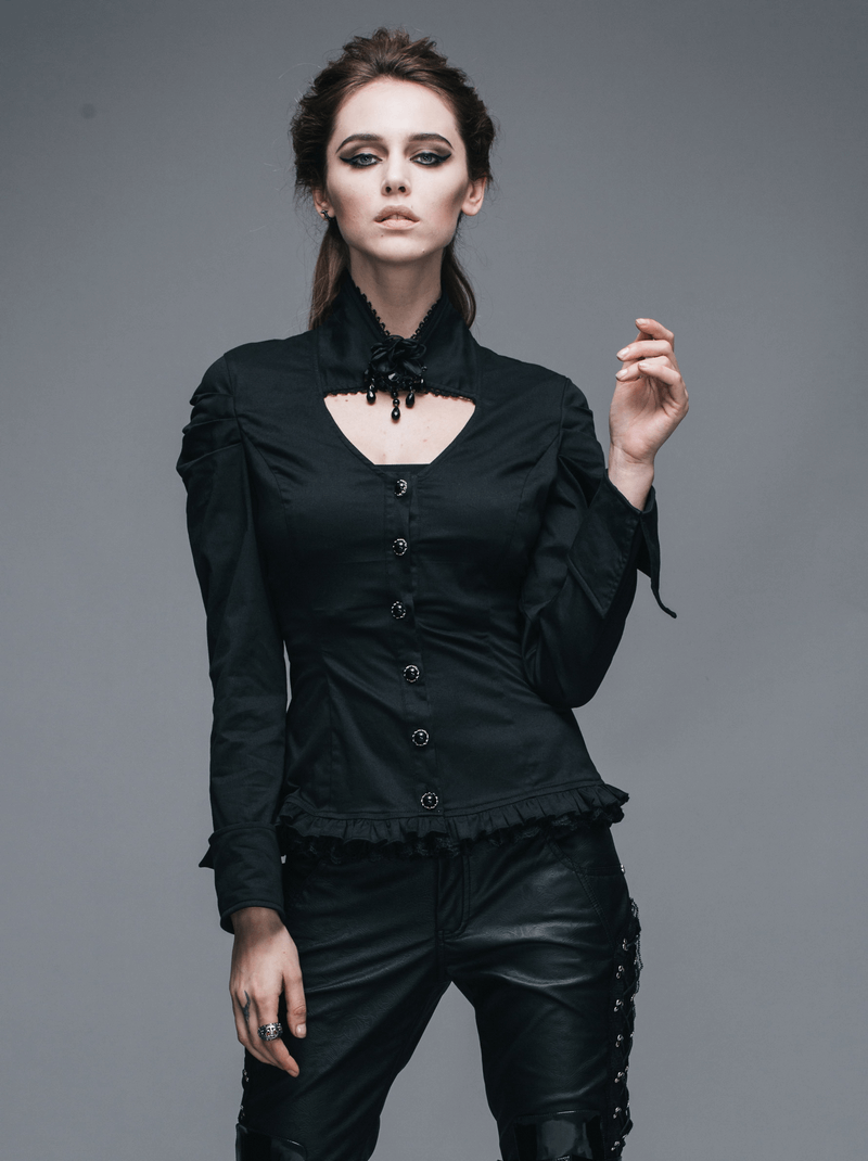 Elegant black gothic shirt with flower pendant brooch, featuring a stand collar and graceful cut for an alluring look.