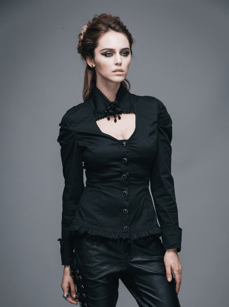 Elegant women's gothic black shirt with flower pendant brooch, stylish cut and stand collar, perfect for a gothic wardrobe.