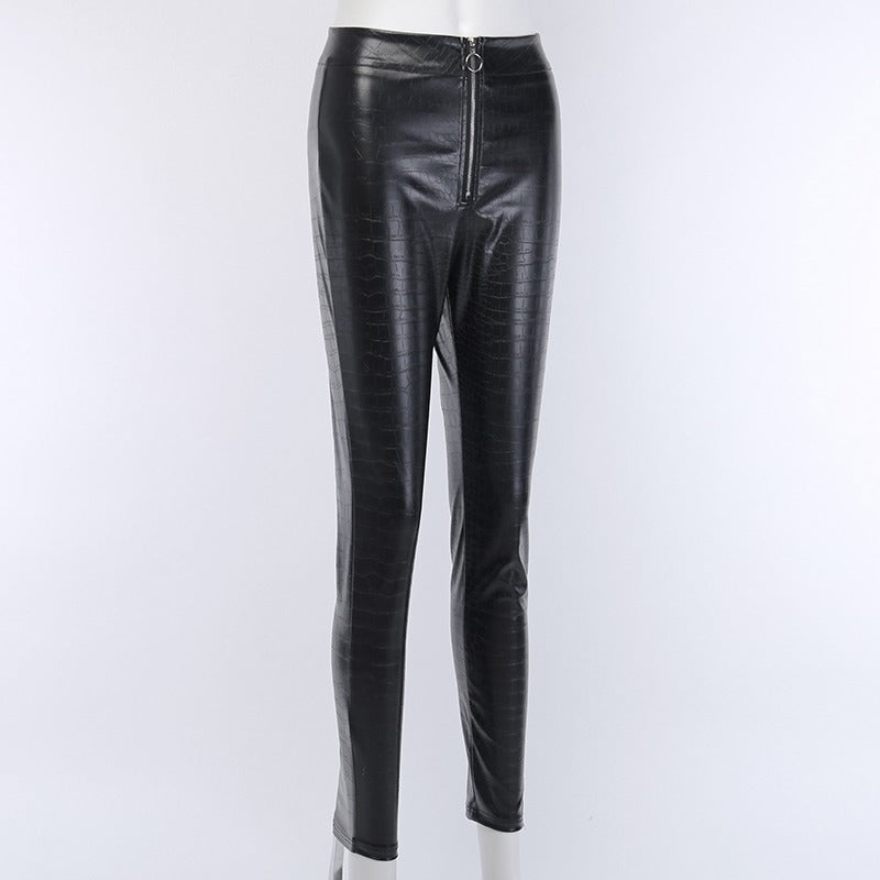 Elegant high waist faux leather skinny pants with snake print and Gothic zip detail, perfect for rock or goth outfits.