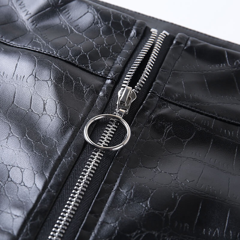 Close-up of high waist faux leather pants featuring a stylish Gothic zip and snake print texture.