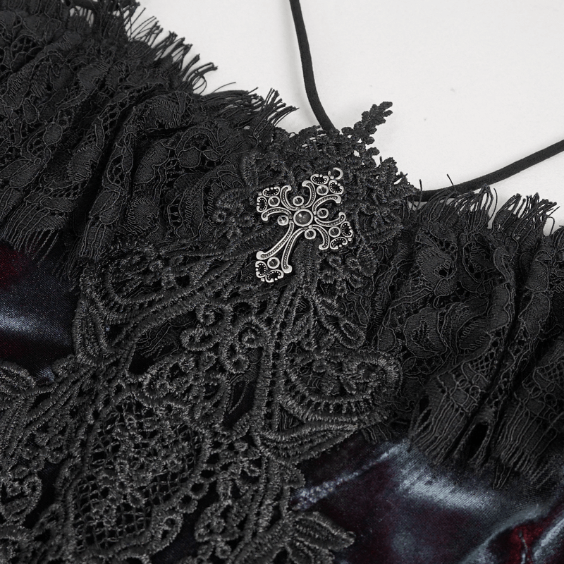 Close-up of elegant black lace appliqué with silver cross detail on off-the-shoulder vintage gothic top for women.