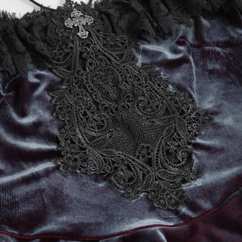Close-up of intricate black lace applique on an elegant off-the-shoulder top, showcasing gothic style and vintage charm.