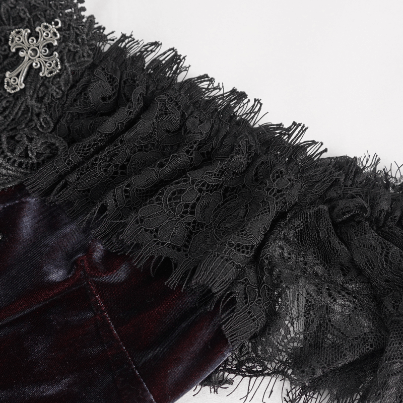 Elegant black lace and velvet detail on an off-shoulder top, embodying vintage gothic style.