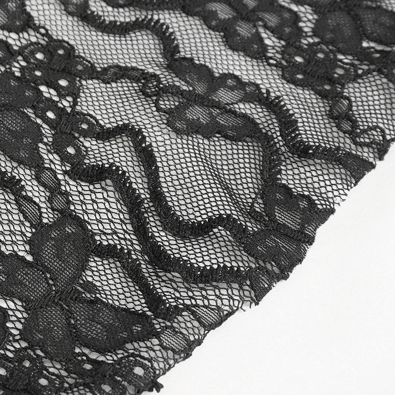 Close-up of elegant black lace fabric with floral patterns, perfect for gothic-style dresses and outfits.