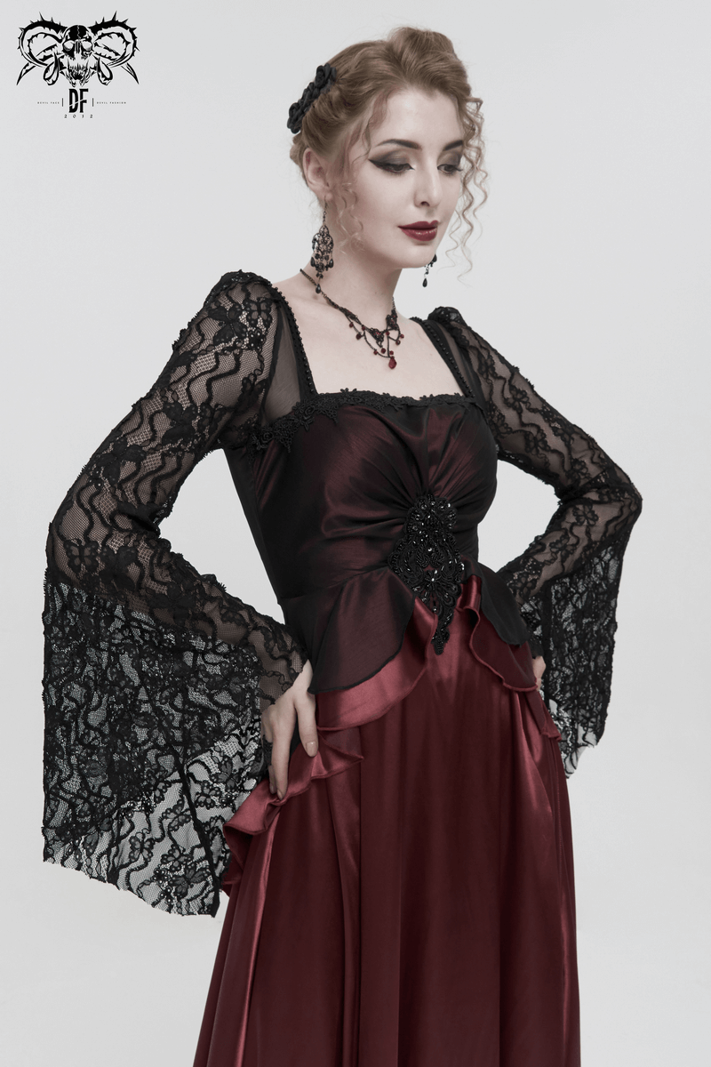 Elegant gothic wine red dress with black lace sleeves and appliquéd detail, perfect for chic occasions.