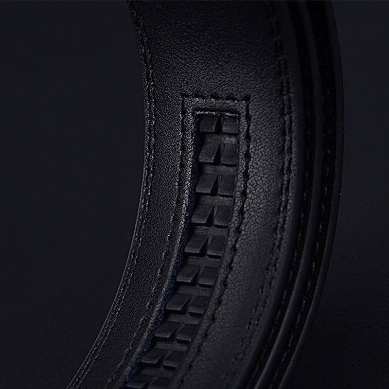 Close-up of an elegant men's genuine leather belt showcasing intricate stitching and sleek black finish.