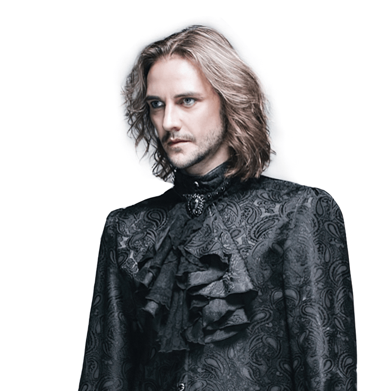 Elegant man in a black Victorian-style shirt with ruffles, showcasing a gothic fashion statement.