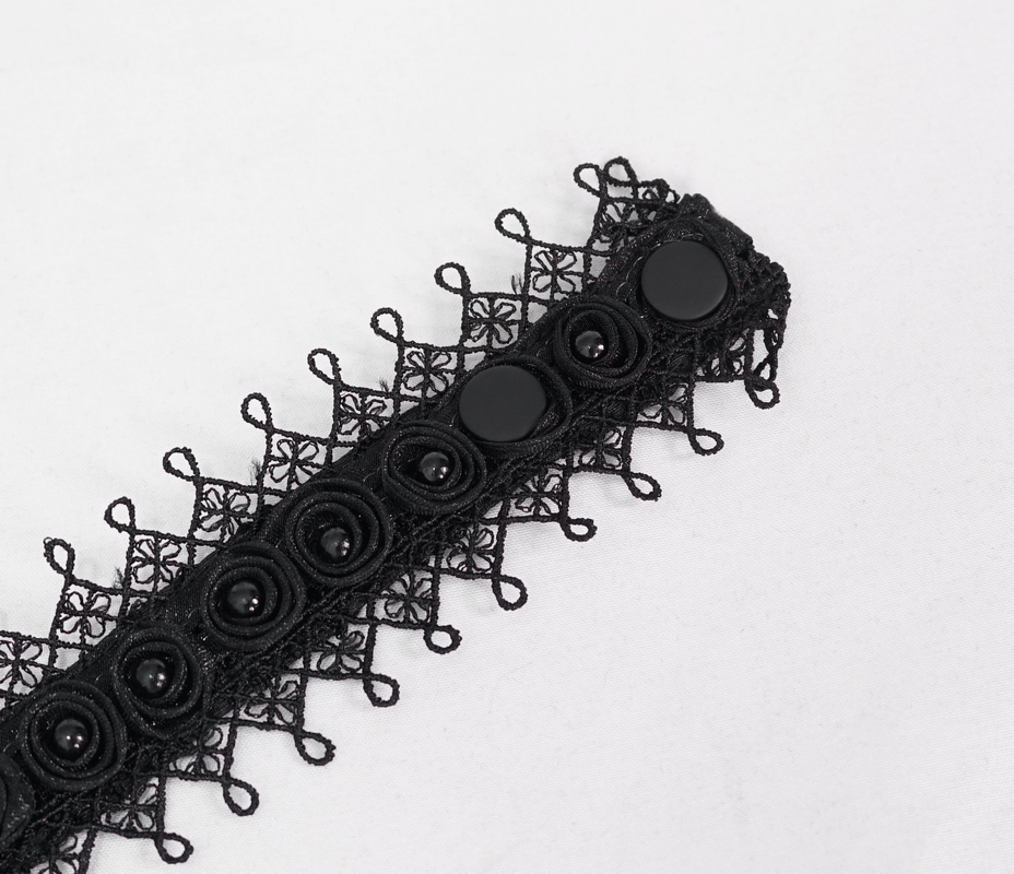 Elegant black lace trim with buttons, perfect for gothic fashion accessories and costume embellishments.