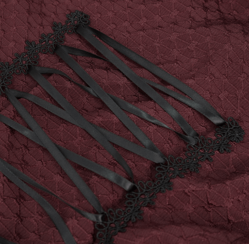 Detailed view of the lace-up design on the back of an elegant women's gothic off-shoulder shirt.
