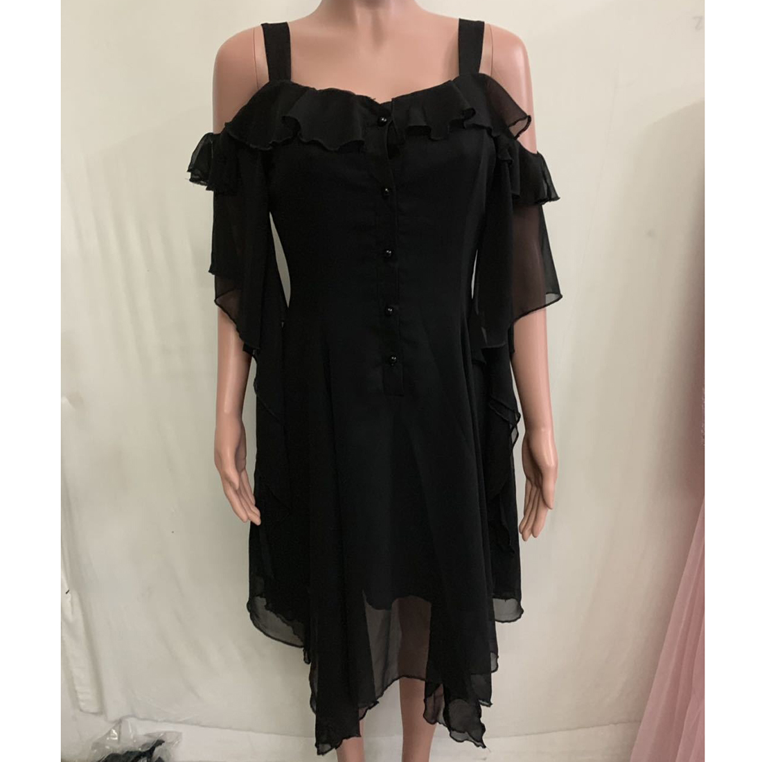 Elegant black off shoulder dress with ruffles and buttons, perfect for gothic fashion and stylish occasions.