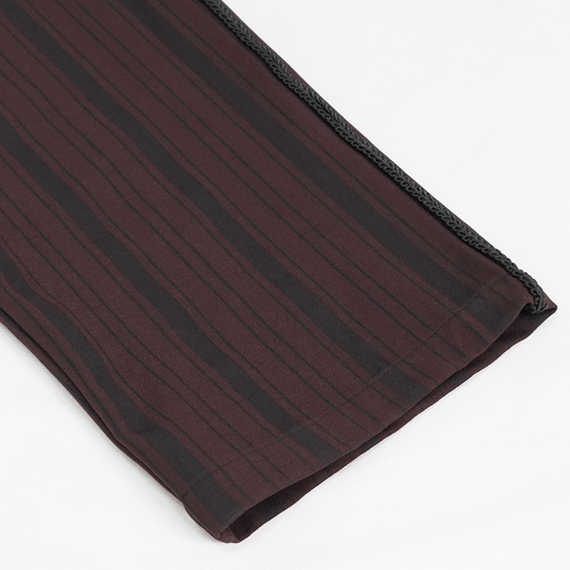 Close-up of elegant wine red straight high-waisted pants, featuring ribbed texture and sleek black detailing.