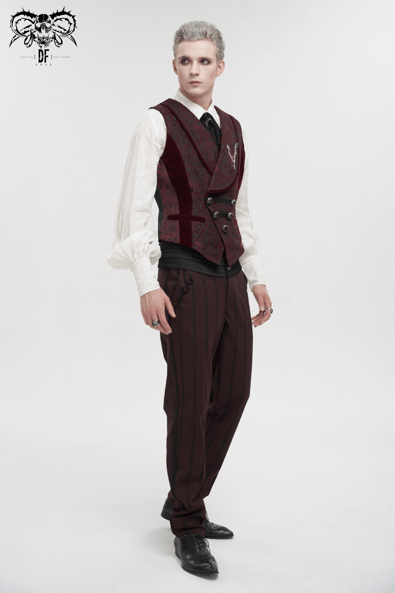 Stylish man in a burgundy vest and dark trousers, showcasing elegant gothic fashion.