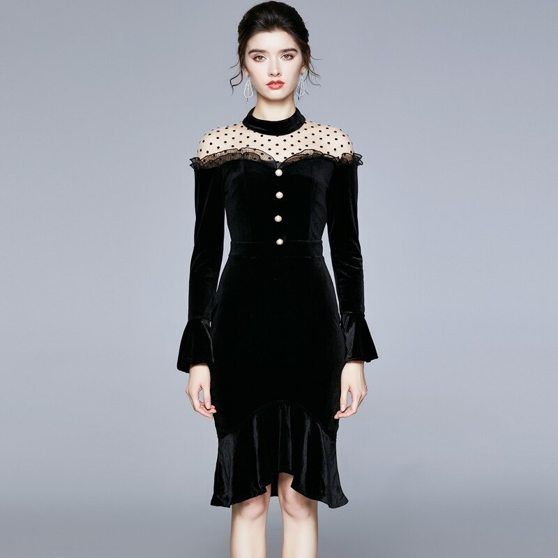 Elegant black velvet dress for women with long sleeves and polka dot sheer detailing, perfect for gothic fashion.