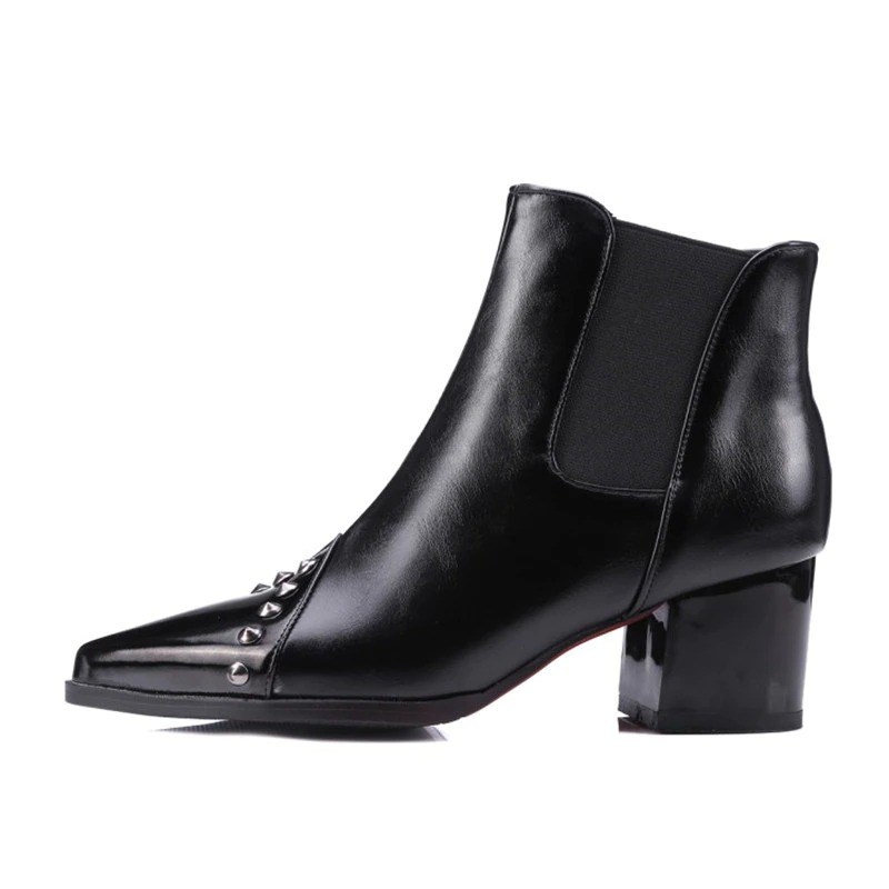 Elegant women's black pointed ankle boots with thick heels and chic spikes, perfect for casual style.