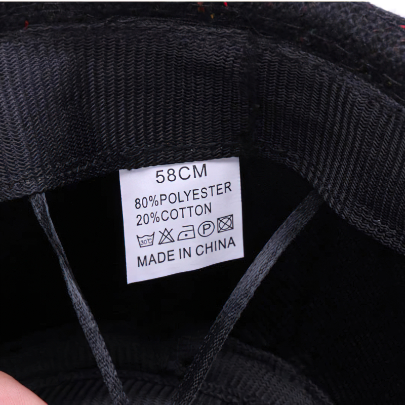 Label inside an elegant woolen hat showing size and fabric composition, made of 80% polyester and 20% cotton.