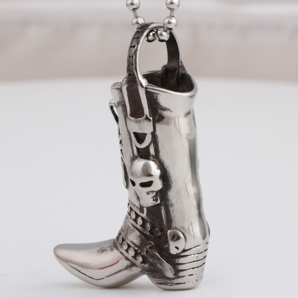Engraved skull boot pendant necklace in stainless steel, perfect for rock style jewelry lovers.