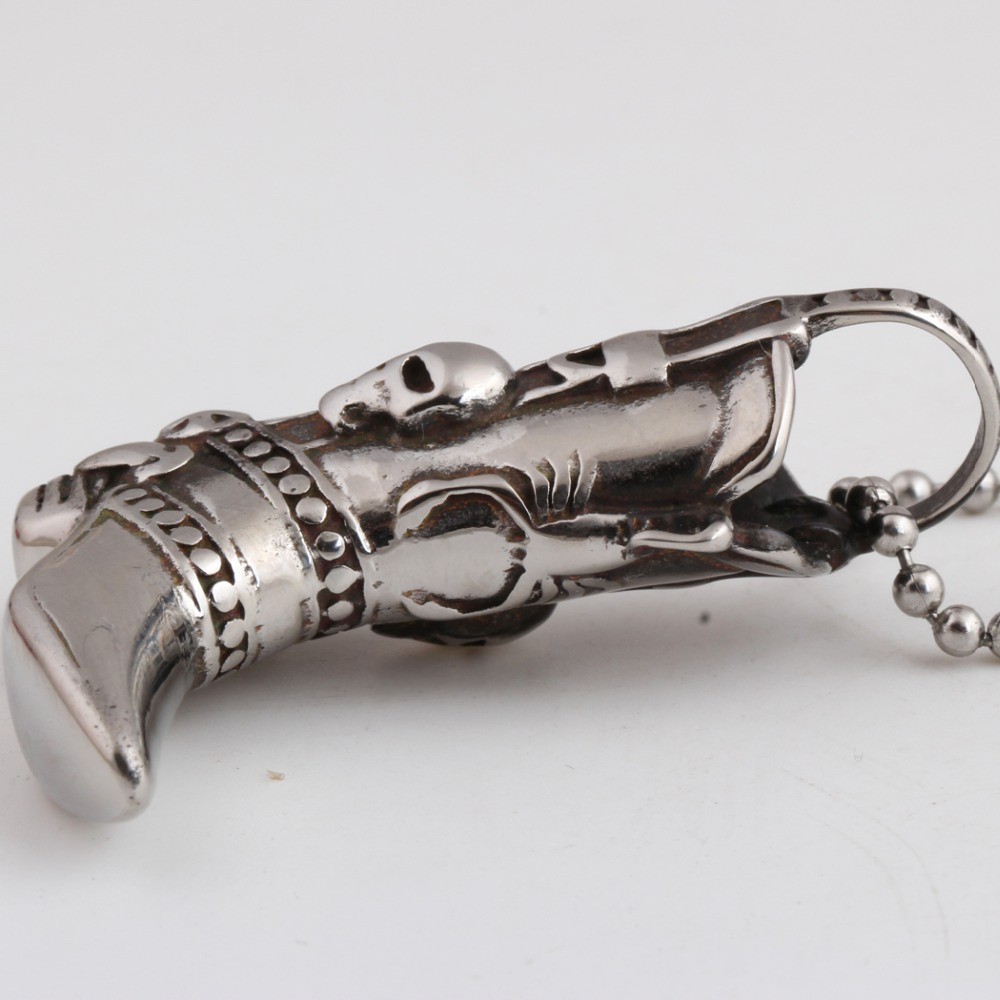 Engraved stainless steel boot pendant necklace with skull design, perfect for punk rock style.