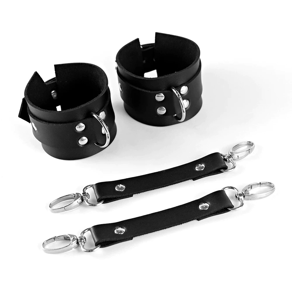 Sexy black leather bracelets with silver fittings for women in BDSM style, perfect for intimate games and playful adventures.
