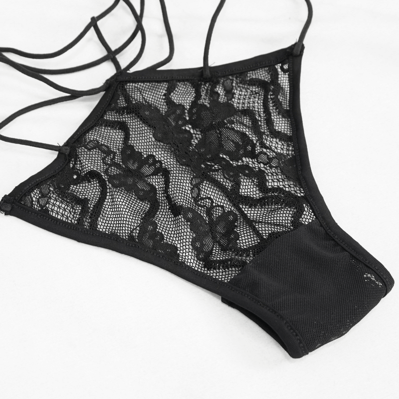 Gothic black lace lingerie set with intricate mesh design and stylish straps for a sexy and elegant look.