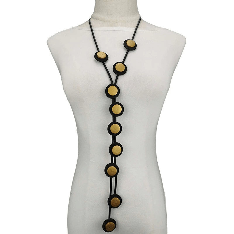 Stylish ethnic long pendant necklace for women, featuring rubber and gold accents, perfect for gothic fashion lovers.