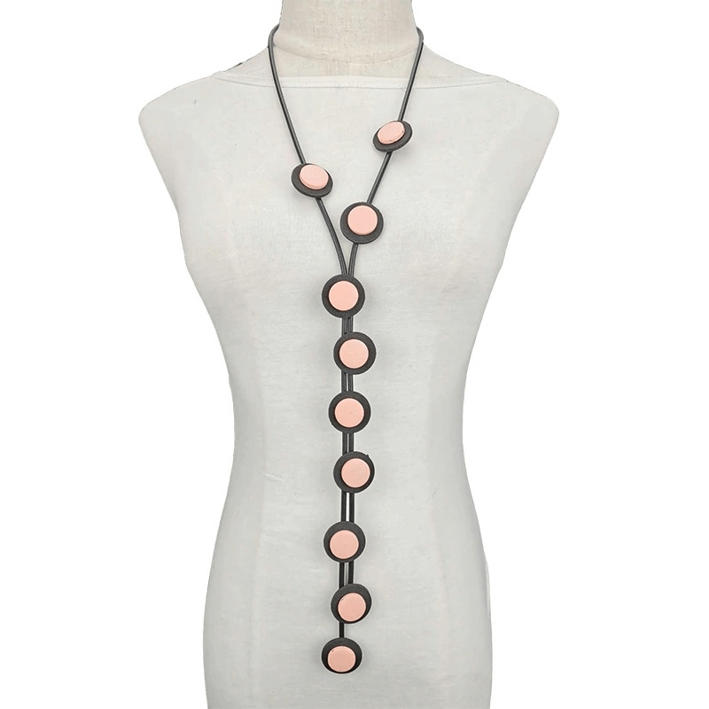 Ethnic long pendant necklace for women, featuring gothic style with pink rubber accents and a unique design.