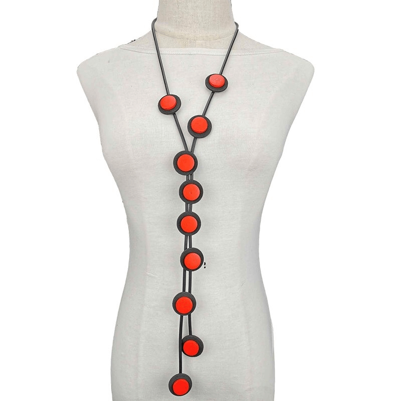 Ethnic long pendant necklace for women featuring red circular accents on a black rubber chain, perfect gothic accessory.