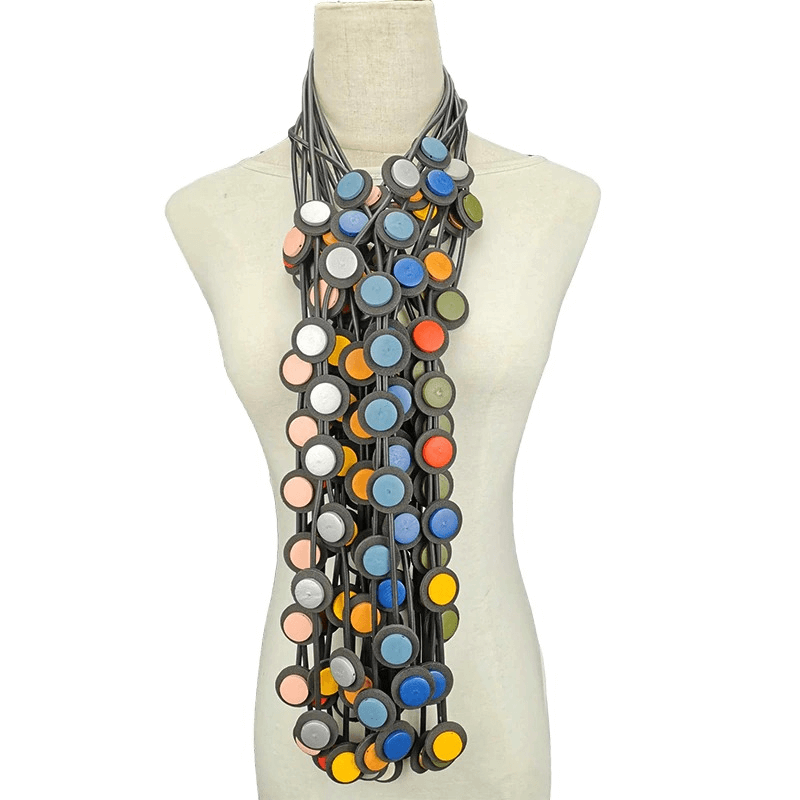Long rubber necklace with colorful circular accents, a trendy ethnic gothic accessory for women.