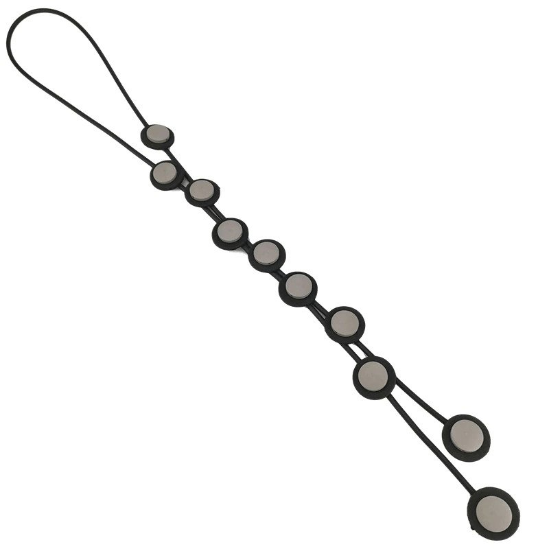 Ethnic long pendant necklace for women in gothic style, featuring unique rubber designs and circular accents.