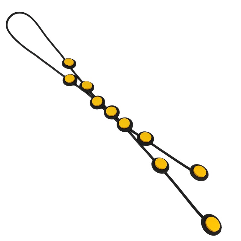 Ethnic long pendant necklace for women featuring a unique design with yellow circles on a black rubber cord.