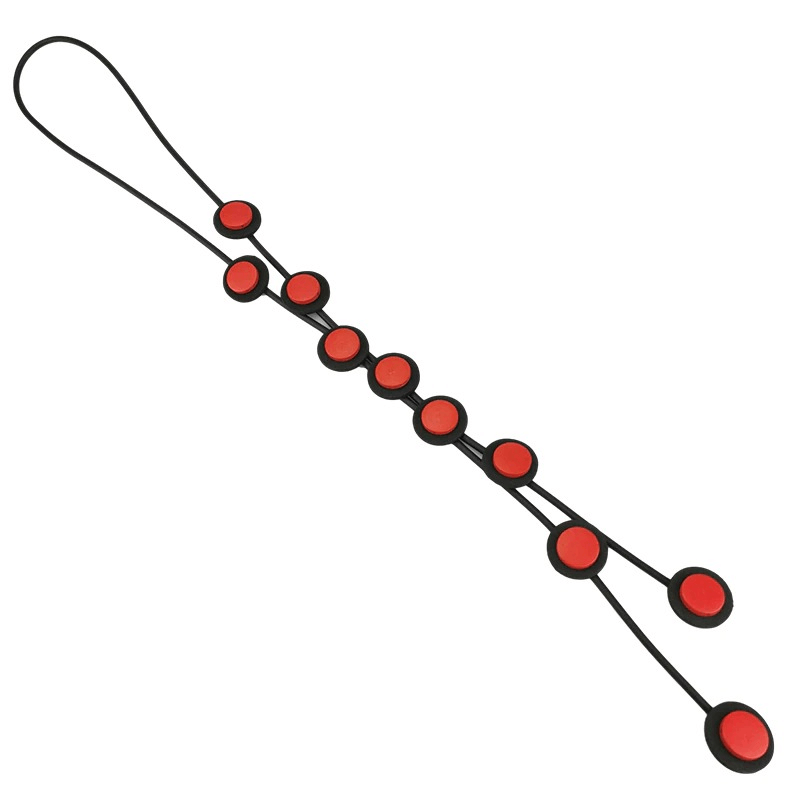 Ethnic long pendant necklace for women featuring a gothic design in red rubber with circular accents.