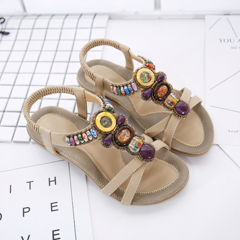 Ethnic style women's beaded sandals in beige with colorful stone decorations, perfect for summer outfits.