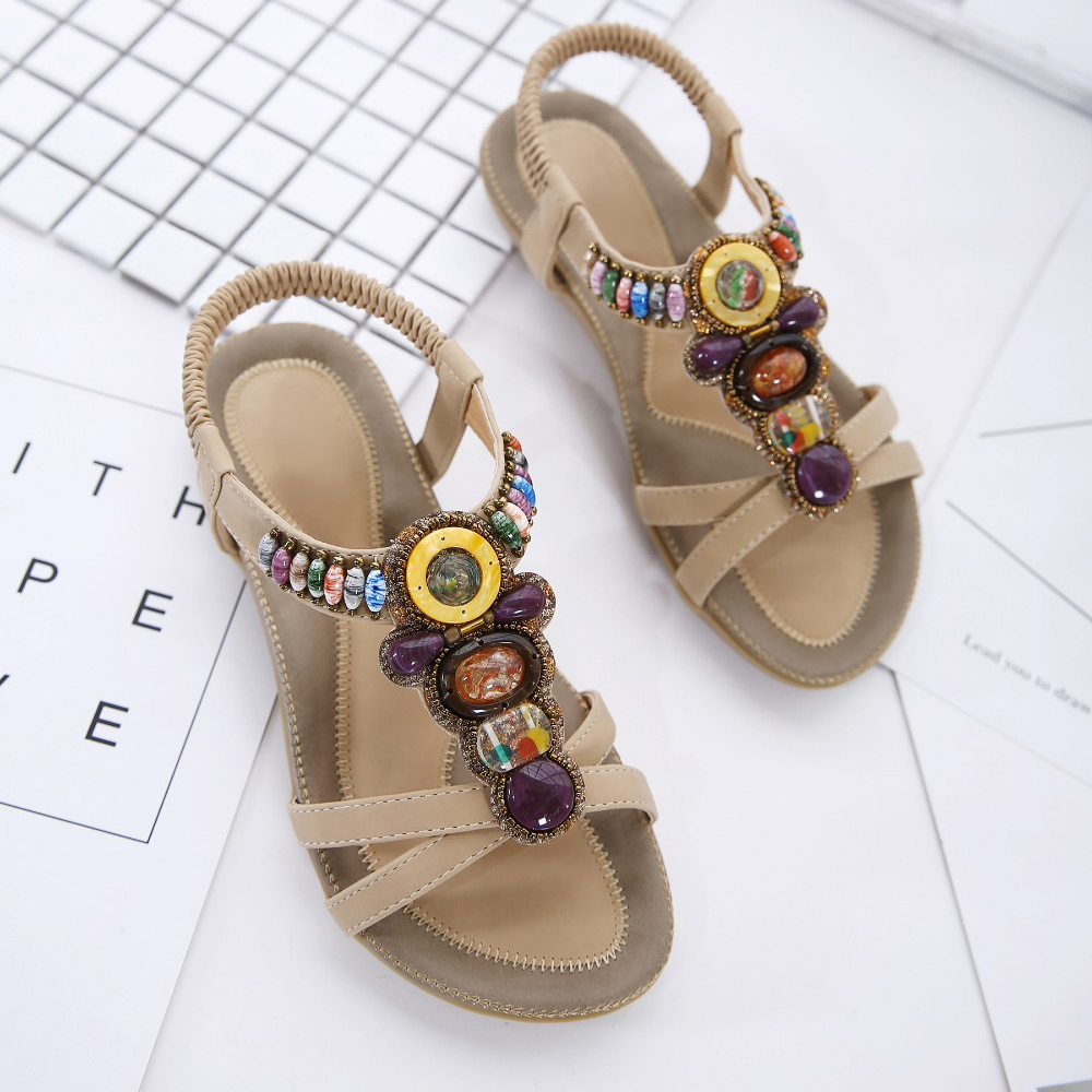 Ethnic style women's beaded sandals with colorful stone decorations, perfect for summer outfits and floral dresses.