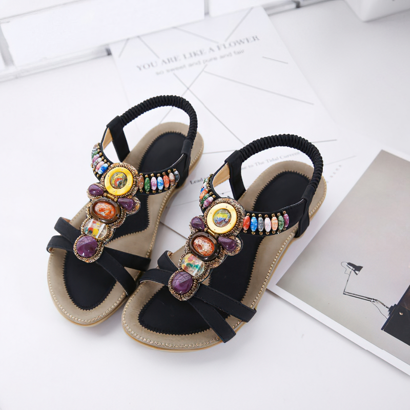 Ethnic style women's beaded sandals with colorful stone decorations on a black background, perfect for summer outfits.