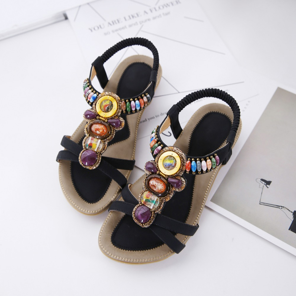 Ethnic style women's beaded sandals with colorful stone decorations, perfect for summer outfits and floral dresses.
