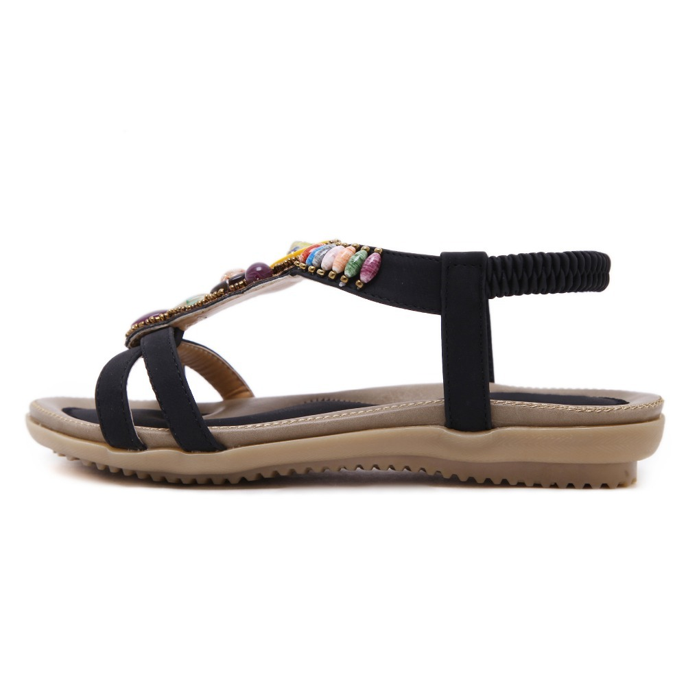 Ethnic style women's beaded sandals with decorative stones, perfect for summer and floral outfits.